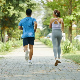 Couple Running Together Outside